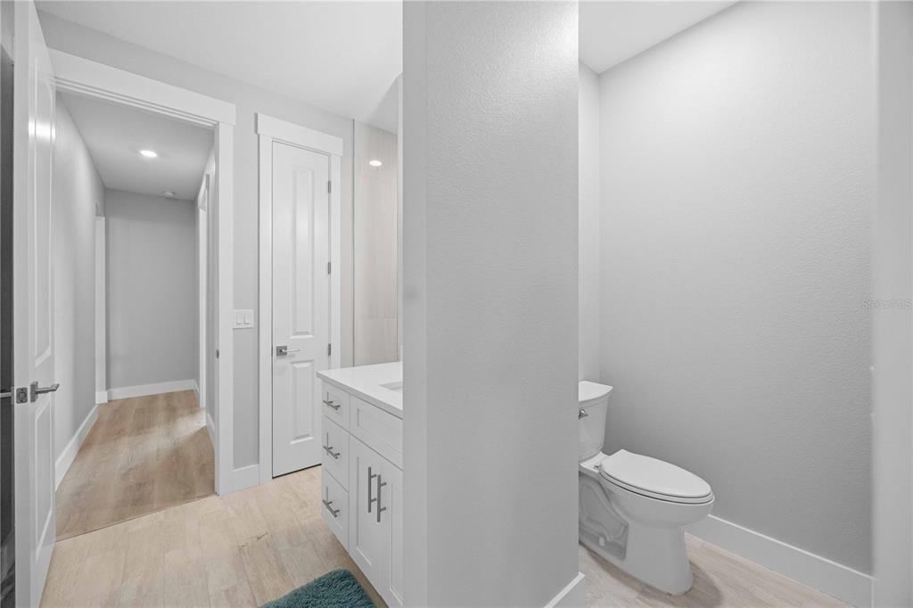 10443 Riverside Road Port Charlotte, FL 33981 - Photo 32 of 64 a bathroom with a sink and a toilet