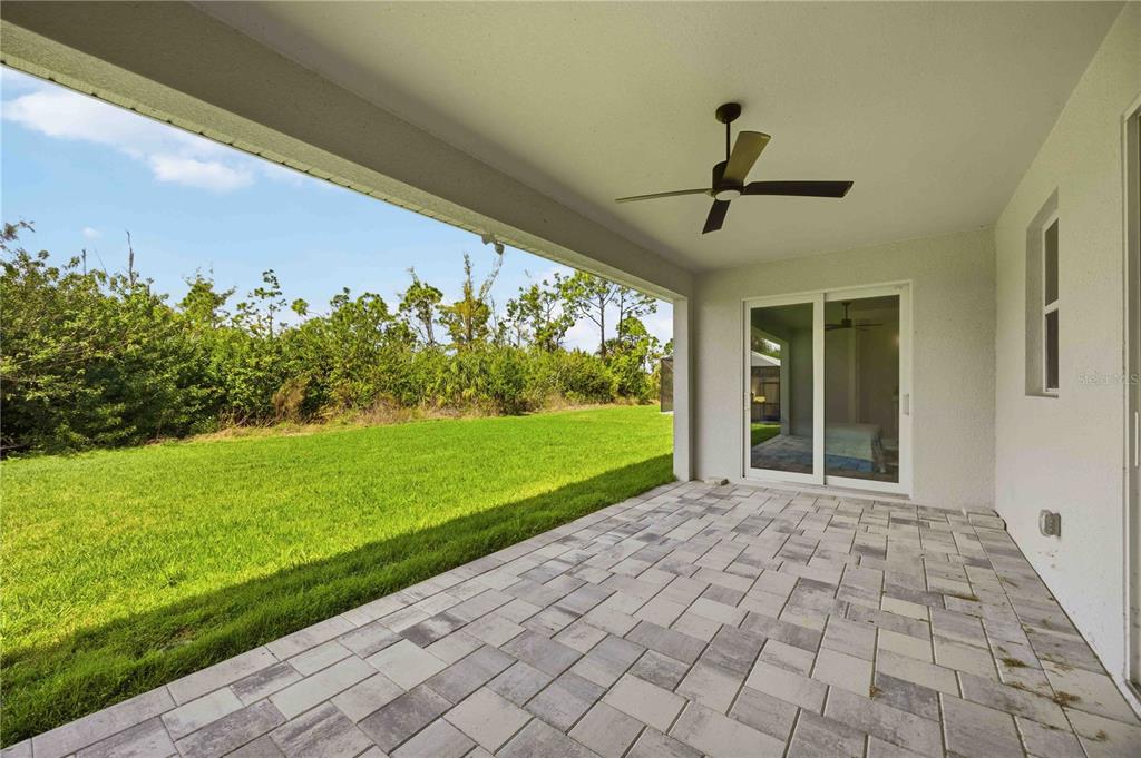 10443 Riverside Road Port Charlotte, FL 33981 - Photo 37 of 64 a view of a porch with furniture and garden