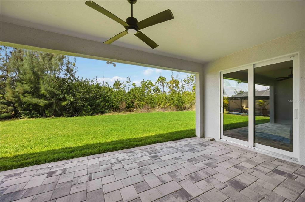 10443 Riverside Road Port Charlotte, FL 33981 - Photo 38 of 64 a view of a porch with furniture and garden
