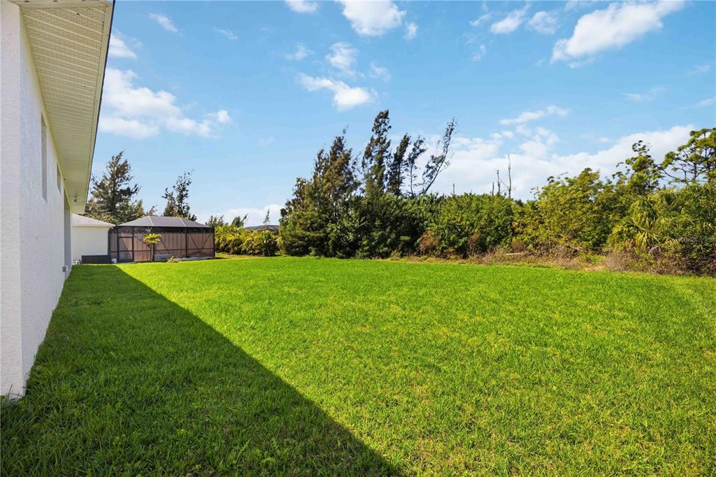 10443 Riverside Road Port Charlotte, FL 33981 - Photo 41 of 64 a view of green field