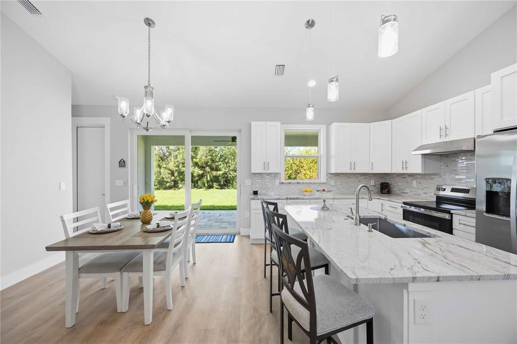 10443 Riverside Road Port Charlotte, FL 33981 - Photo 6 of 64 a view of a dining room and livingroom view