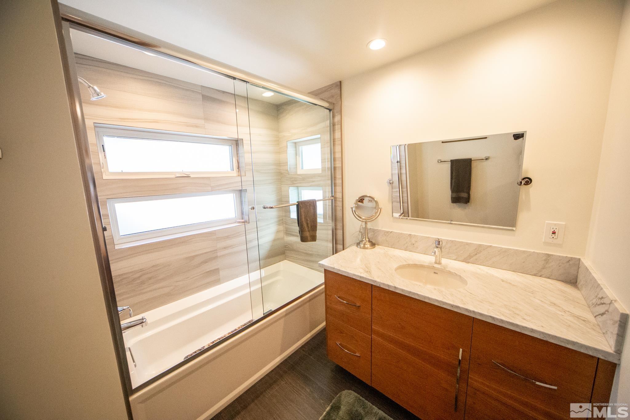 301 Cedar Drive Stateline, NV 89449 - Photo 15 of 27 a bathroom with a sink and a bathtub