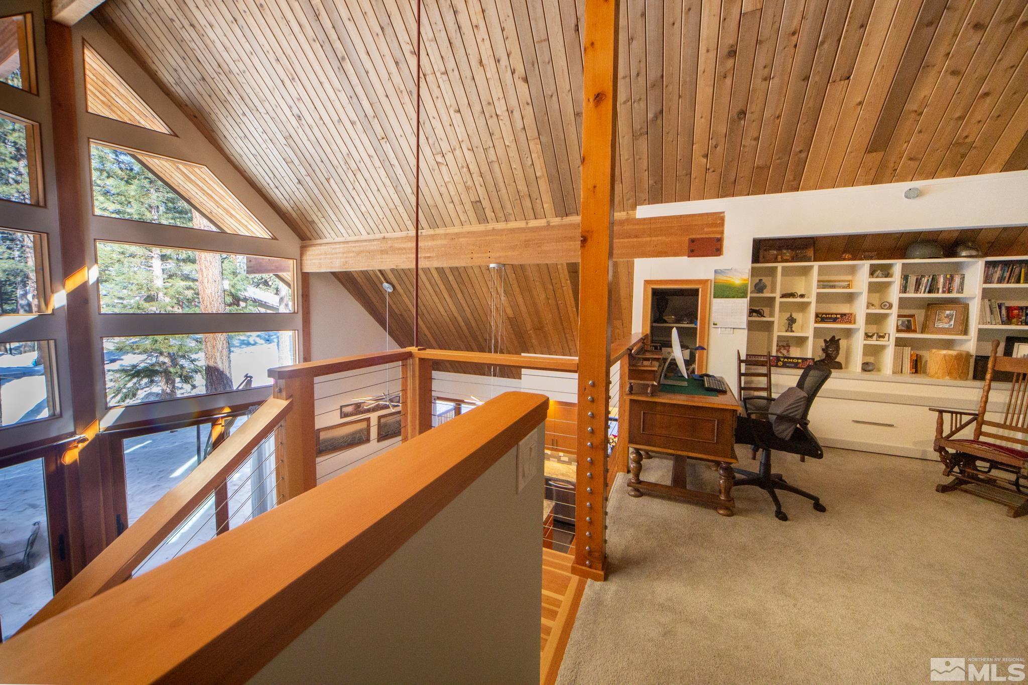 301 Cedar Drive Stateline, NV 89449 - Photo 22 of 27 a view of a chairs and table in the balcony