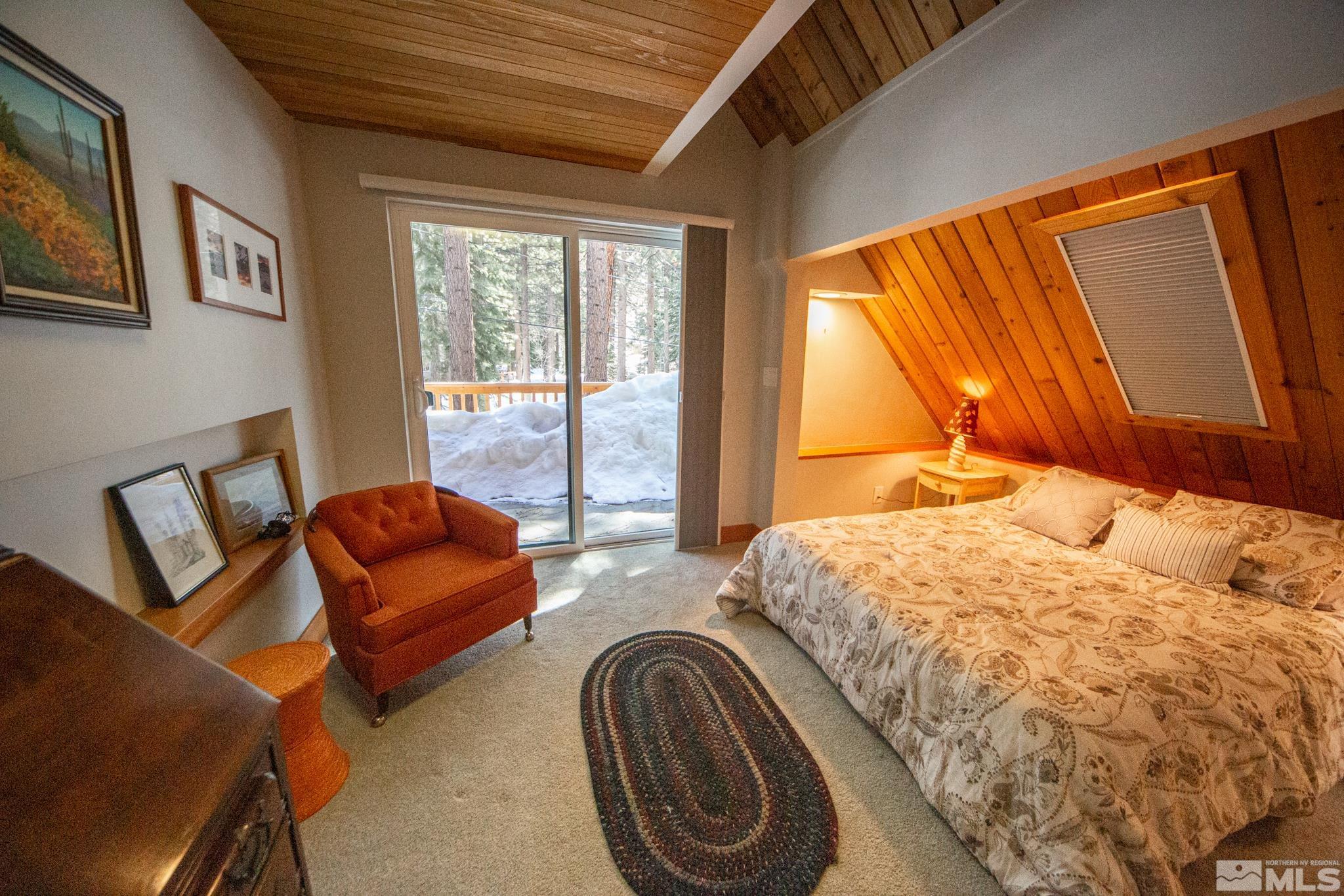 301 Cedar Drive Stateline, NV 89449 - Photo 27 of 27 a bedroom with bed and balcony