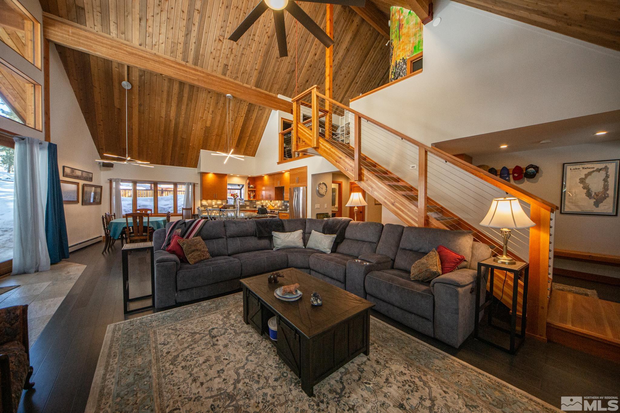 301 Cedar Drive Stateline, NV 89449 - Photo 5 of 27 a living room with furniture a ceiling fan and a rug