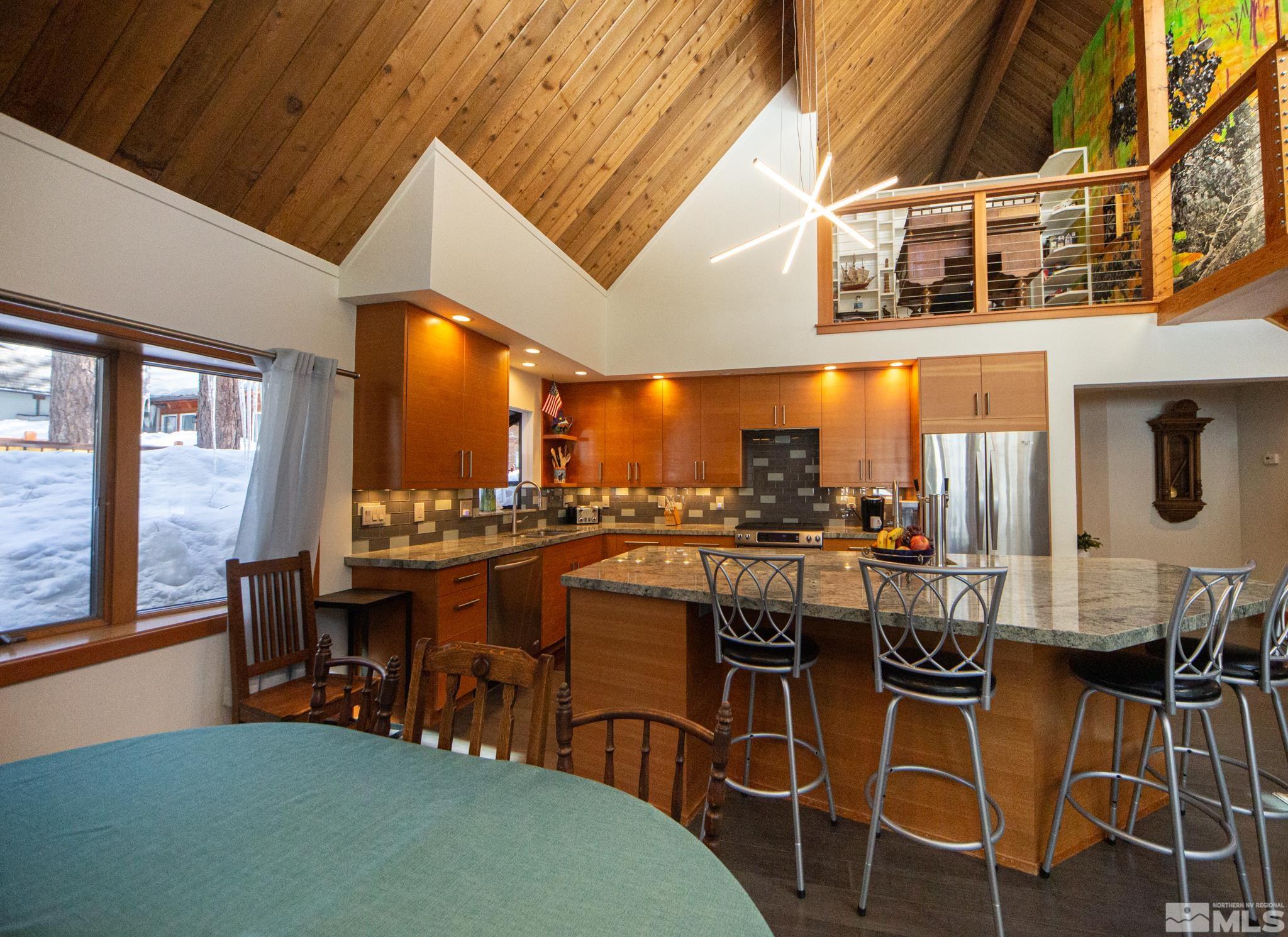 301 Cedar Drive Stateline, NV 89449 - Photo 7 of 27 a dinning table and chairs in the room