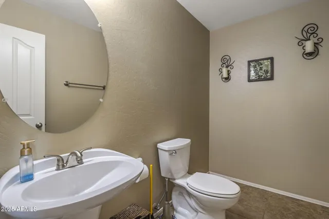 a bathroom with a sink and a toilet