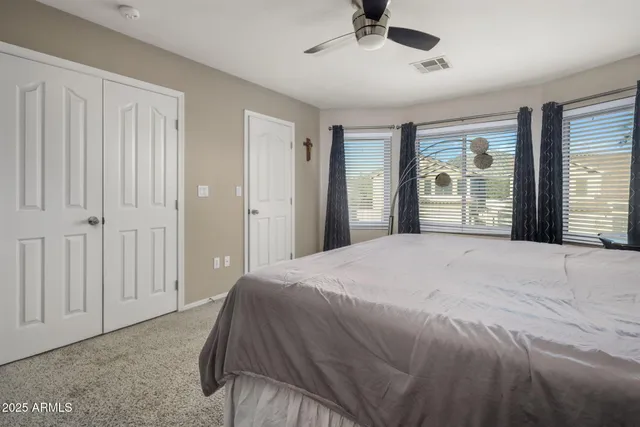 a bathroom with a double vanity sink mirror and