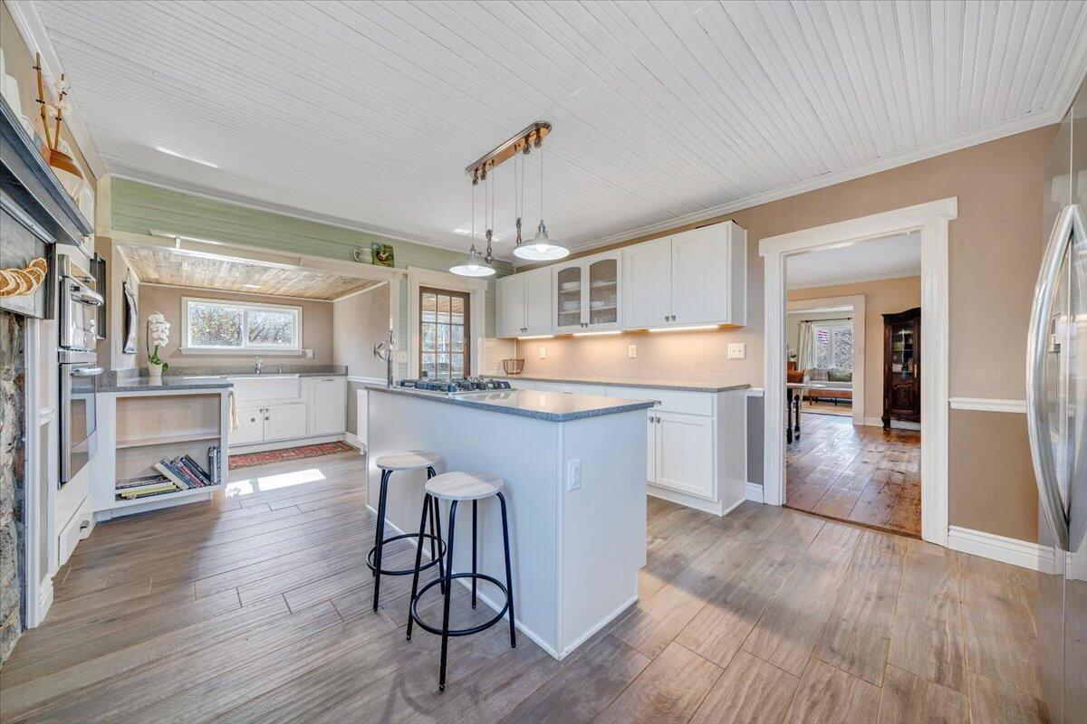 7758 Old Fincastle Road Fincastle, VA 24090 - Photo 26 of 99 a large kitchen with a table and chairs