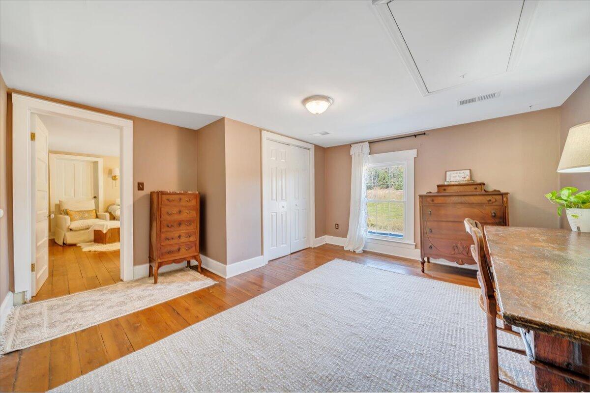 7758 Old Fincastle Road Fincastle, VA 24090 - Photo 44 of 99 a bedroom with furniture and a large window