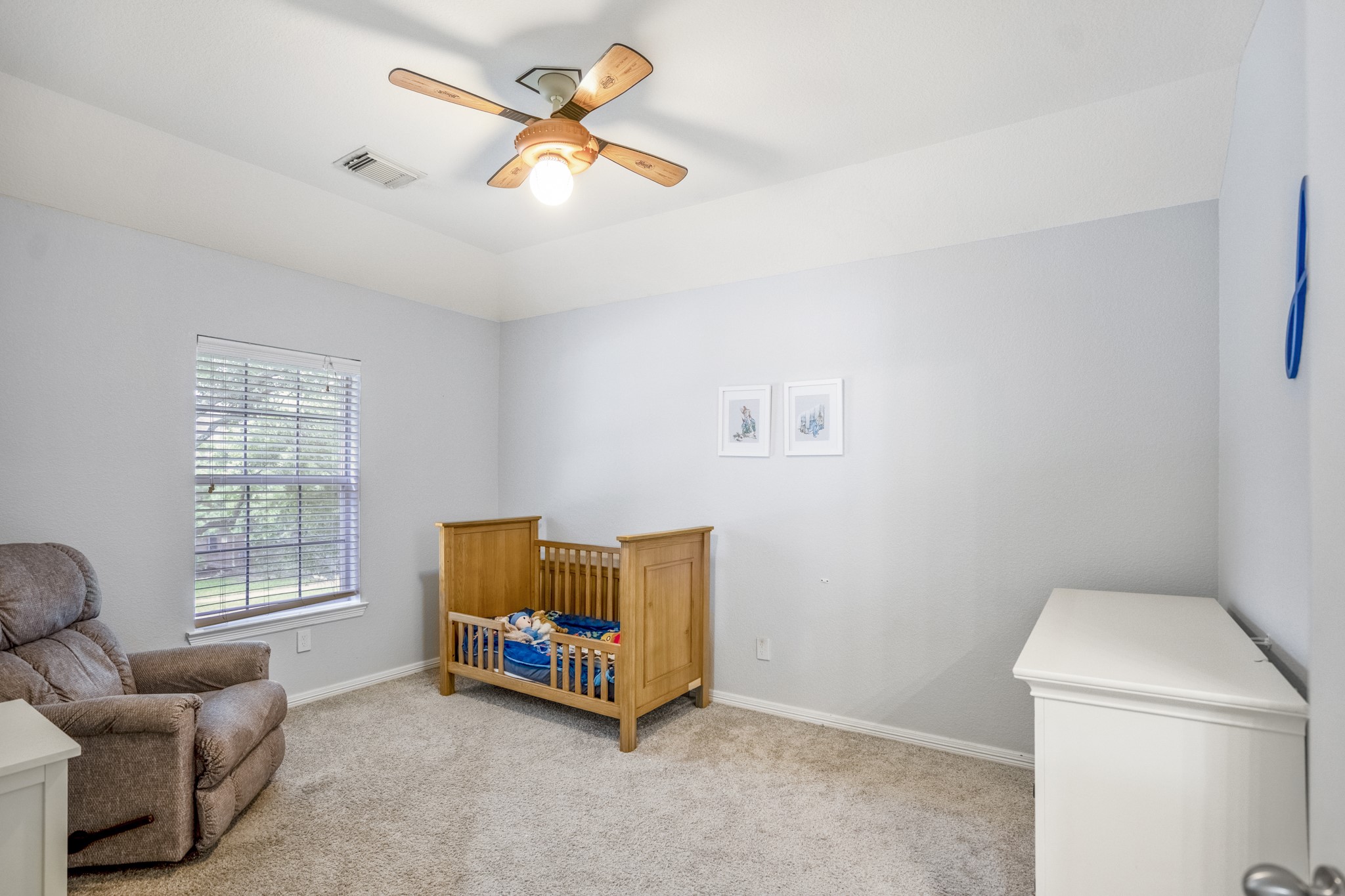 10410 Pitcataway Drive Spring, TX 77379 - Photo 24 of 48 The third bedroom upstairs has an angled ceiling, a nice size closet, a window and lighted ceiling fan, the home features 4 bedrooms with 3 full size bathrooms and 1 guest bathroom.