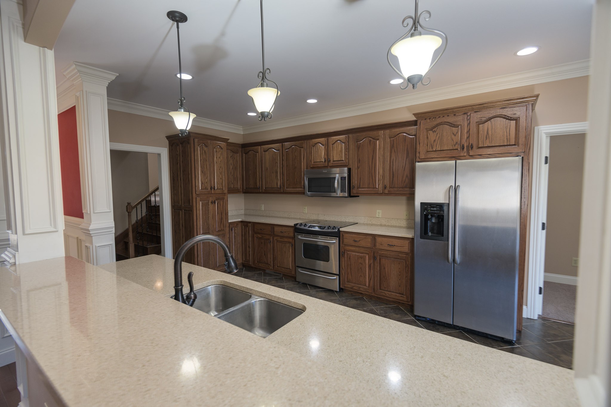 705 Deer Ridge Lane Lebanon, TN 37087 - Photo 13 of 49 a kitchen with stainless steel appliances granite countertop a sink a refrigerator and a granite counter tops