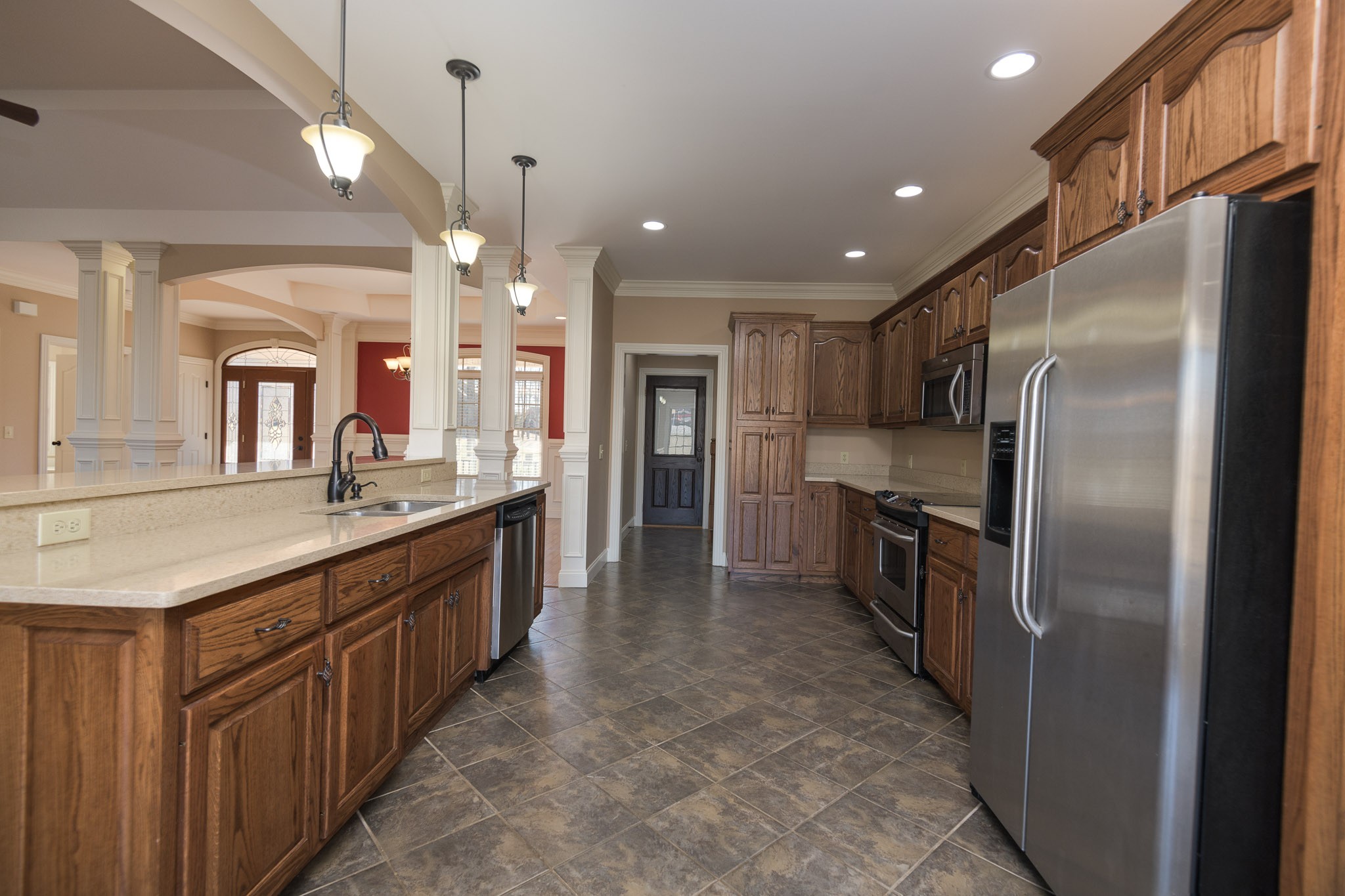705 Deer Ridge Lane Lebanon, TN 37087 - Photo 3 of 49 a kitchen with stainless steel appliances granite countertop a refrigerator a sink a oven and a refrigerator