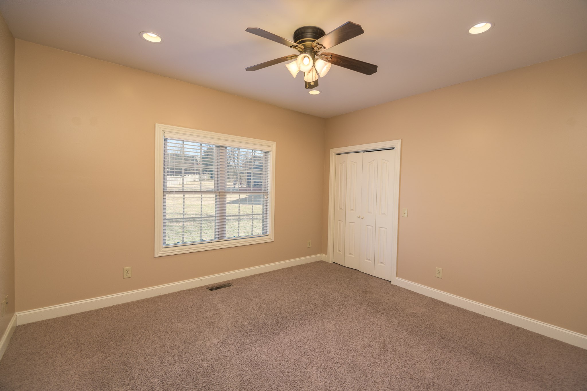 705 Deer Ridge Lane Lebanon, TN 37087 - Photo 30 of 49 a view of a livingroom with a ceiling fan and window