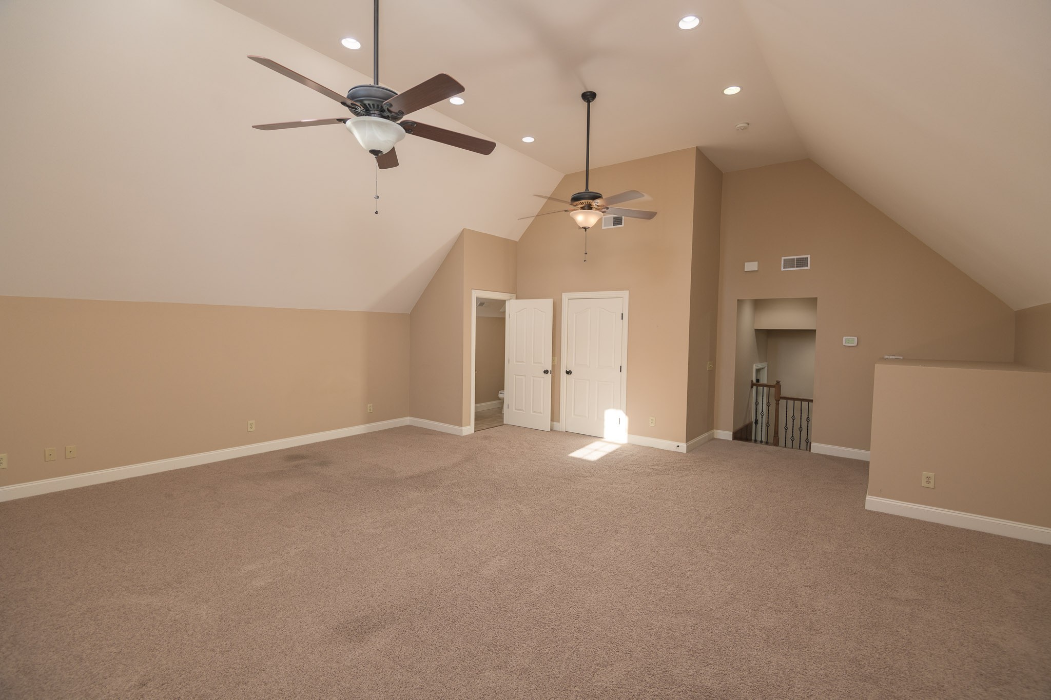 705 Deer Ridge Lane Lebanon, TN 37087 - Photo 32 of 49 an empty room with ceiling fan and window