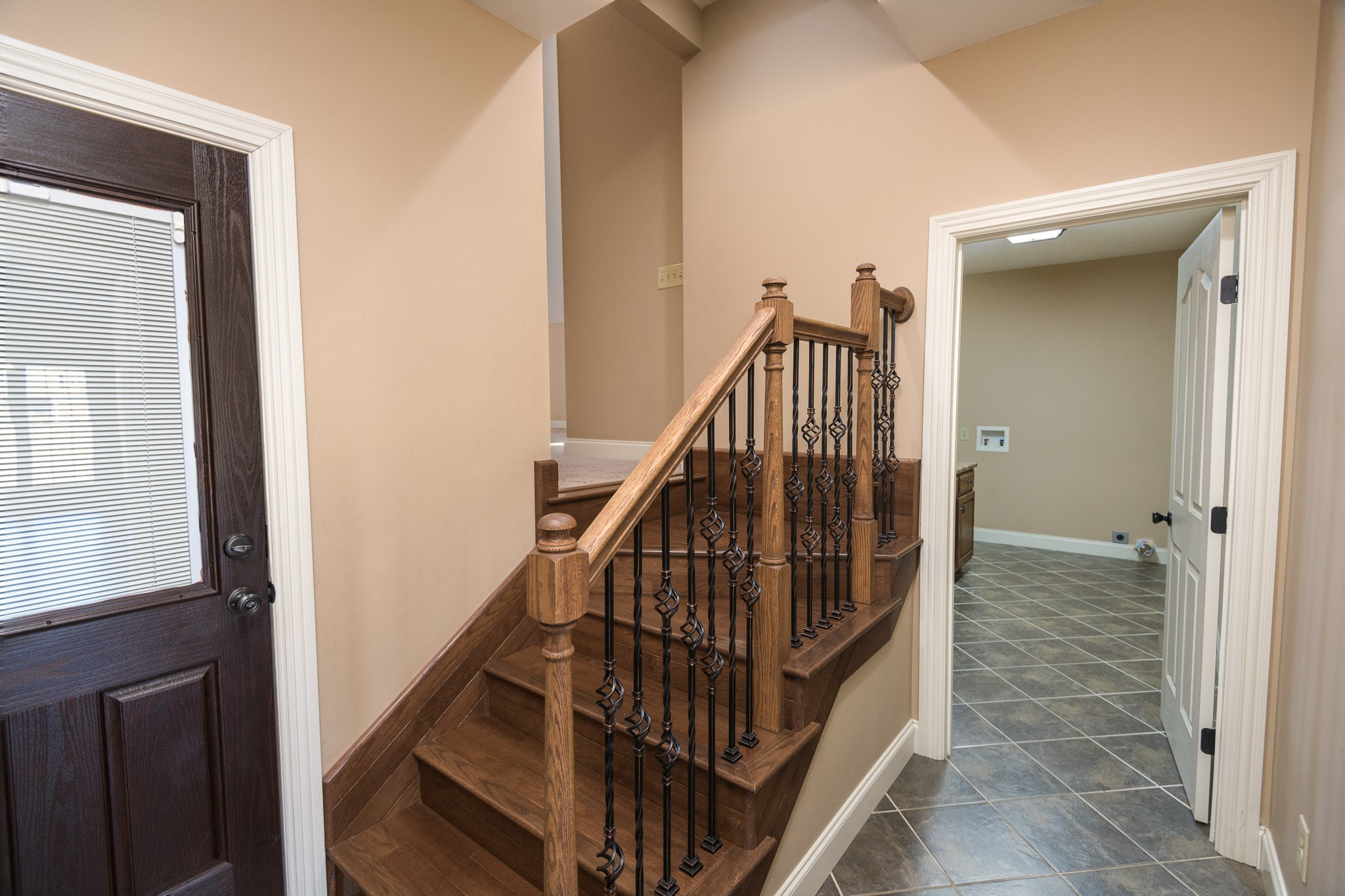 705 Deer Ridge Lane Lebanon, TN 37087 - Photo 34 of 49 a view of staircase with railing and white walls