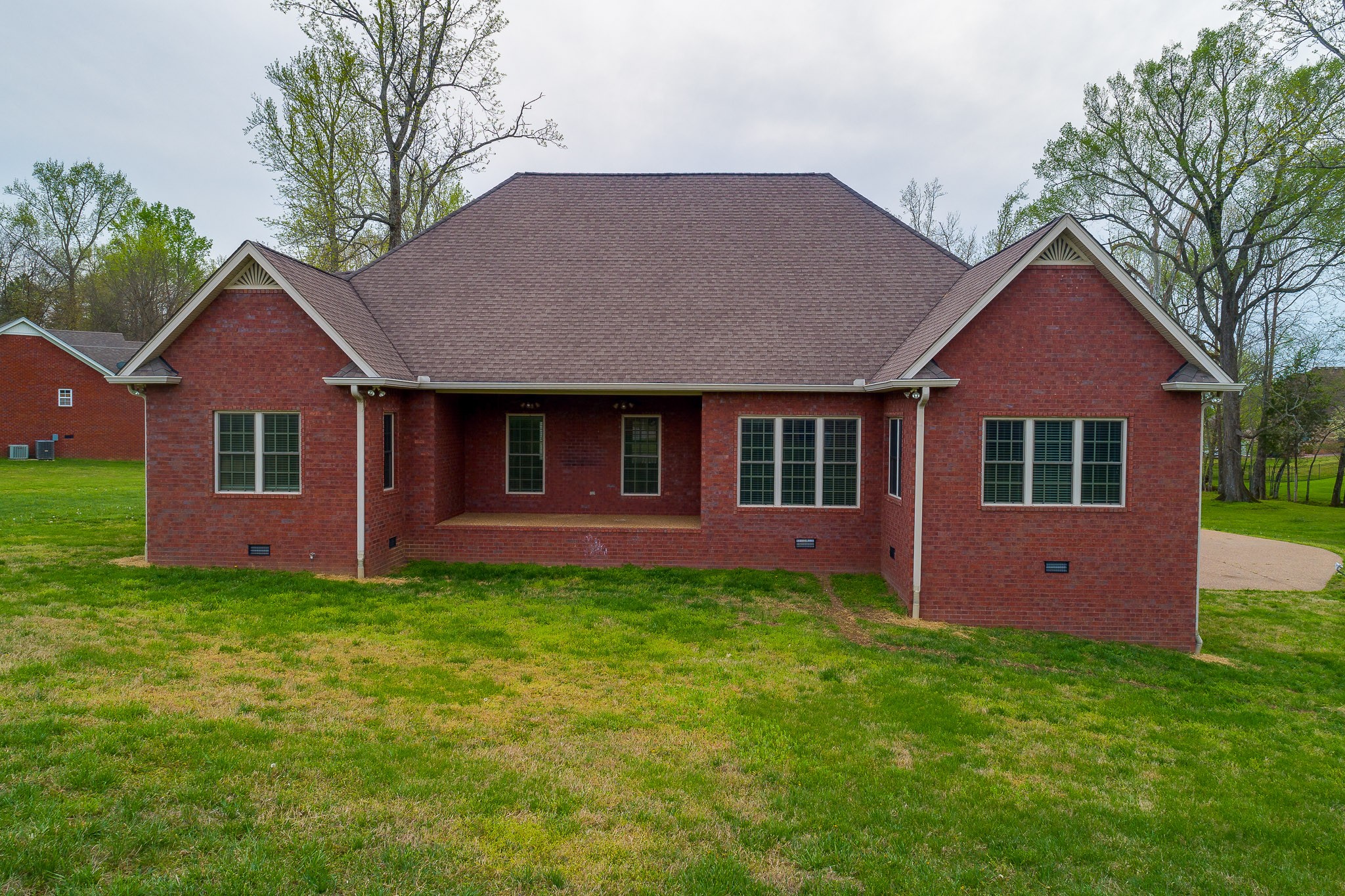 705 Deer Ridge Lane Lebanon, TN 37087 - Photo 39 of 49 a front view of a house with a garden