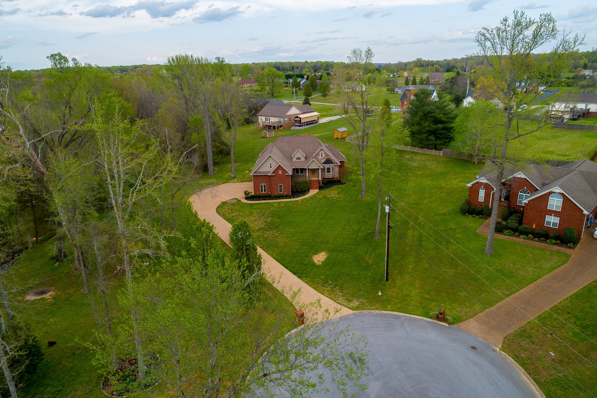 705 Deer Ridge Lane Lebanon, TN 37087 - Photo 44 of 49 an aerial view of a house with yard swimming pool and outdoor seating