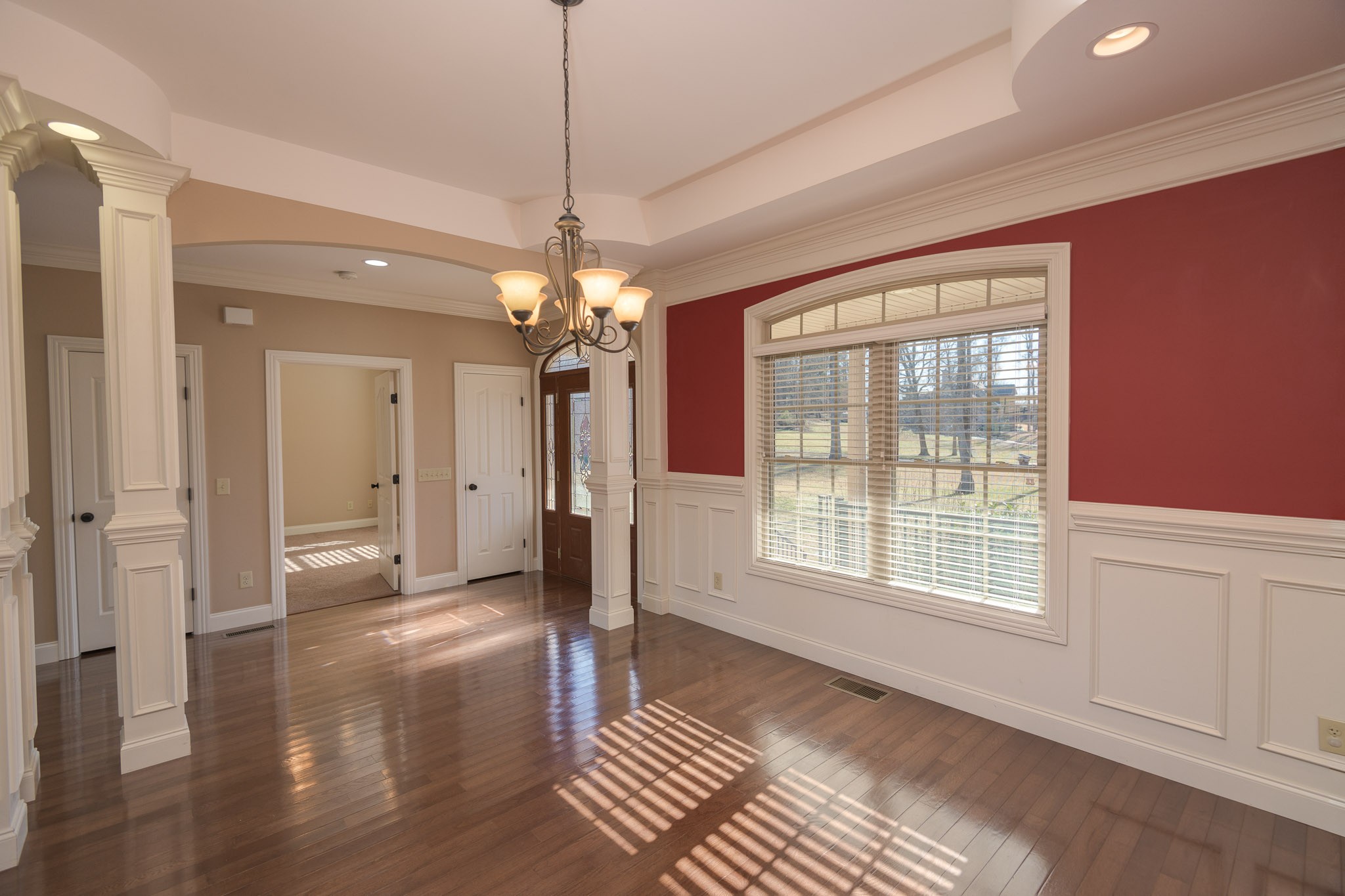 705 Deer Ridge Lane Lebanon, TN 37087 - Photo 8 of 49 a view of a livingroom with a chandelier wooden floor and a chandelier