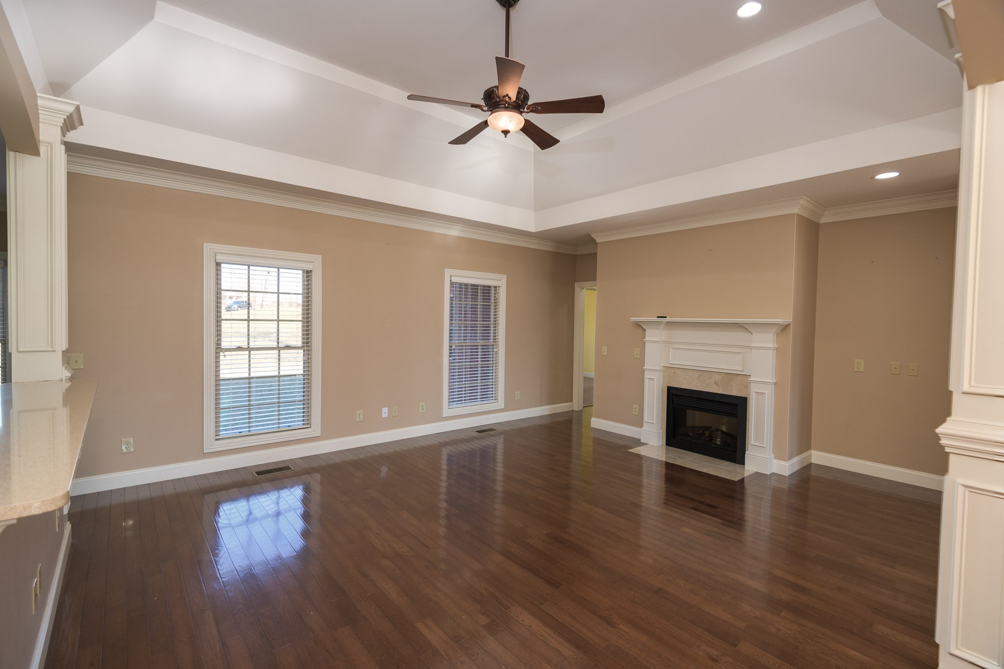 705 Deer Ridge Lane Lebanon, TN 37087 - Photo 9 of 49 a view of an empty room with wooden floor and a window