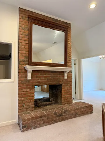 a living room with a fireplace