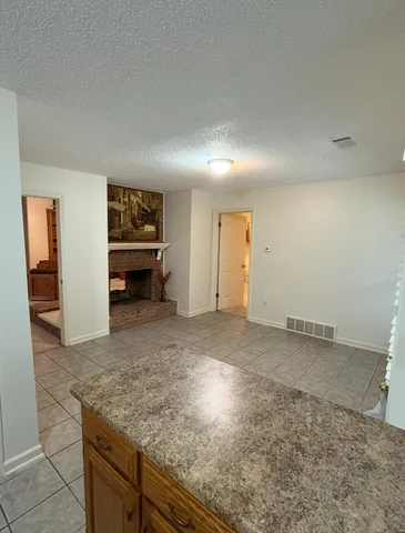 a view of kitchen and living room