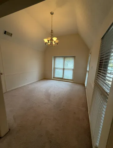 a view of a livingroom with a chandelier