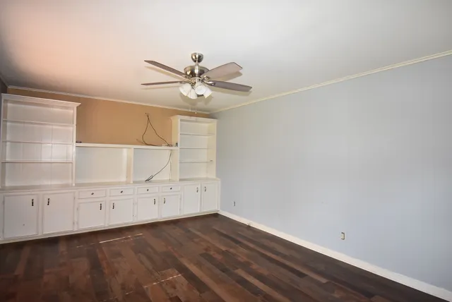 an empty room with cabinet