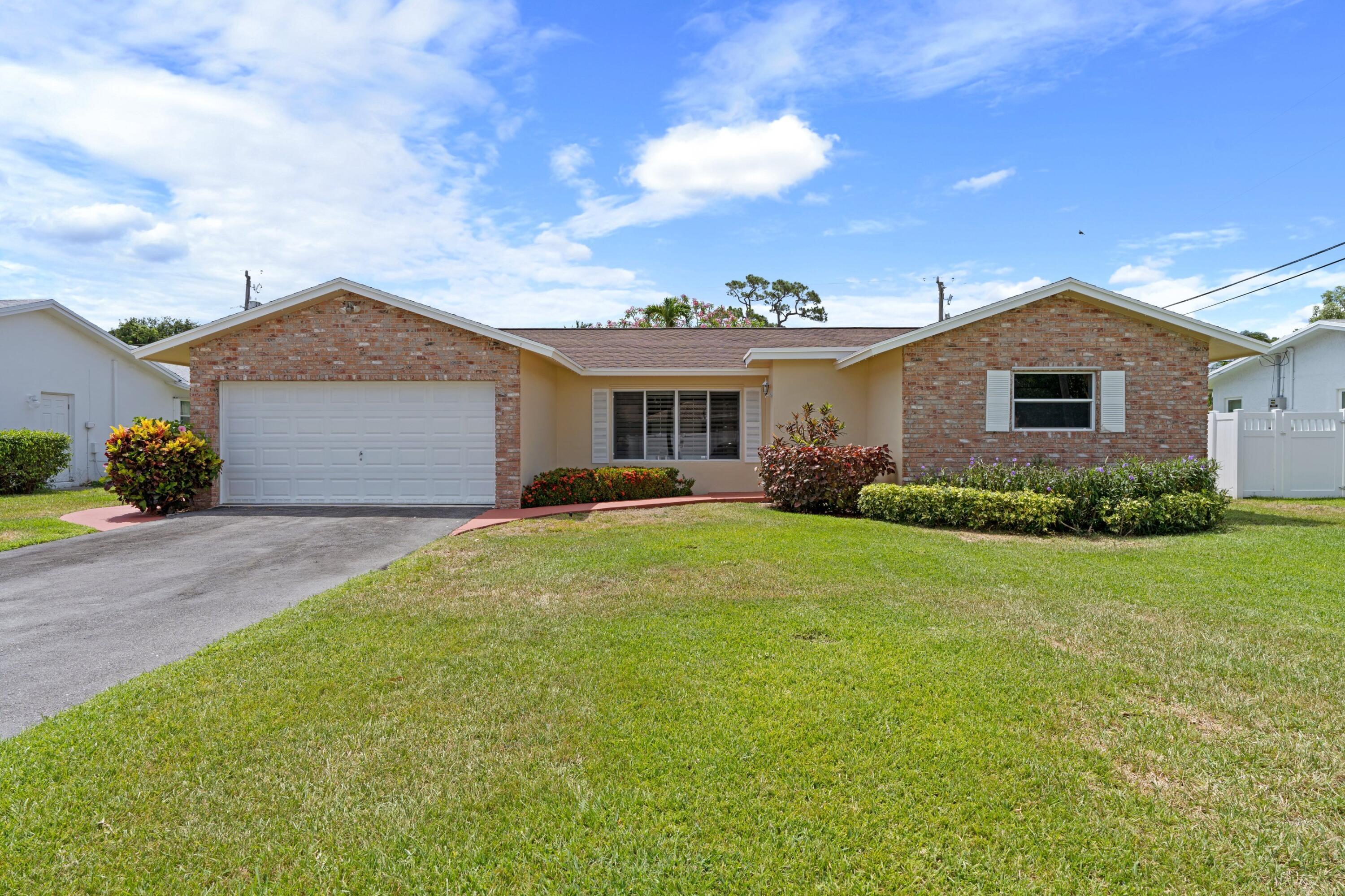 4940 Northwest 3rd Terrace Boca Raton, FL 33431 - Photo 1 of 25 Front Exterior