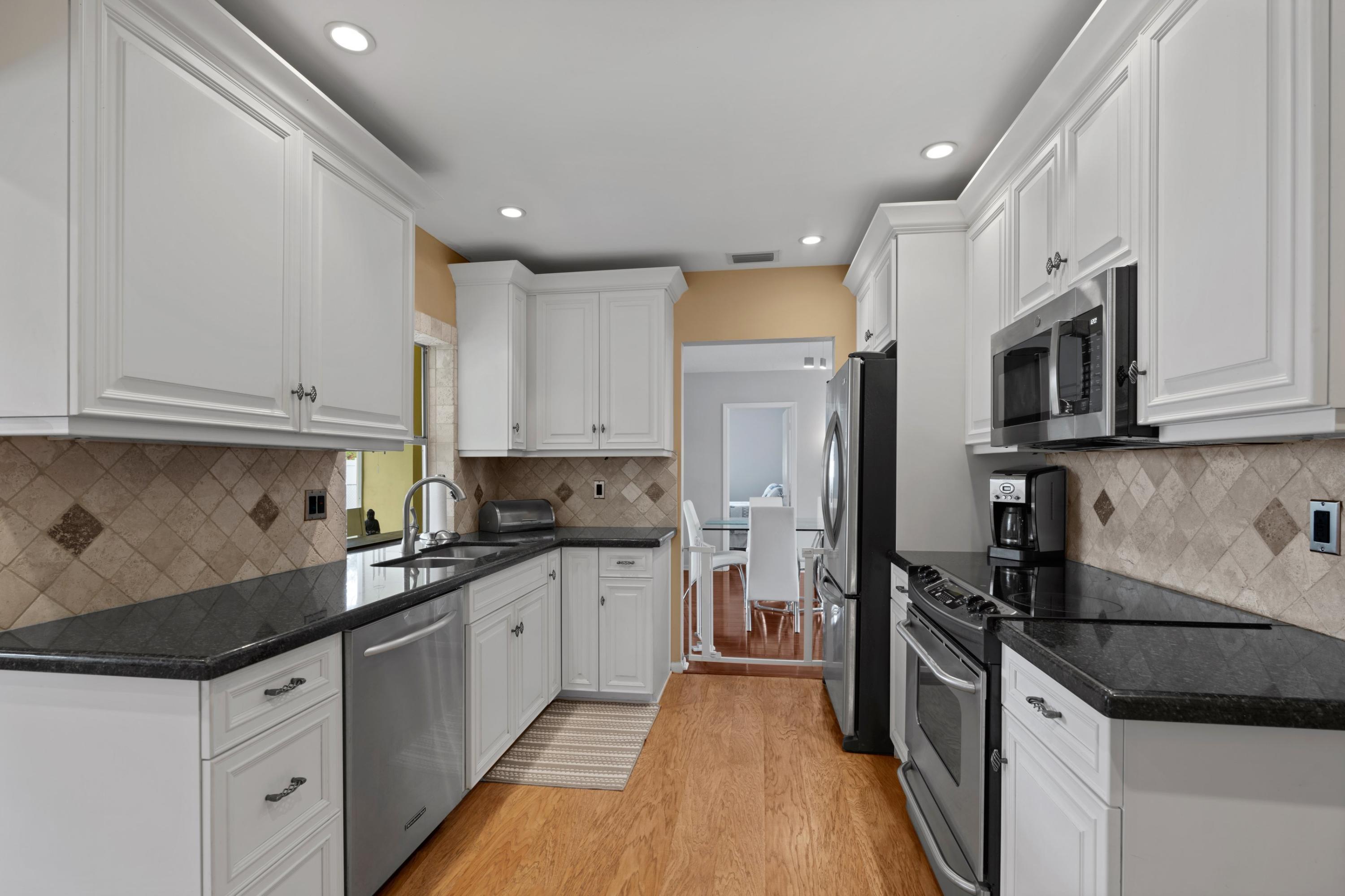 4940 Northwest 3rd Terrace Boca Raton, FL 33431 - Photo 4 of 25 Kitchen