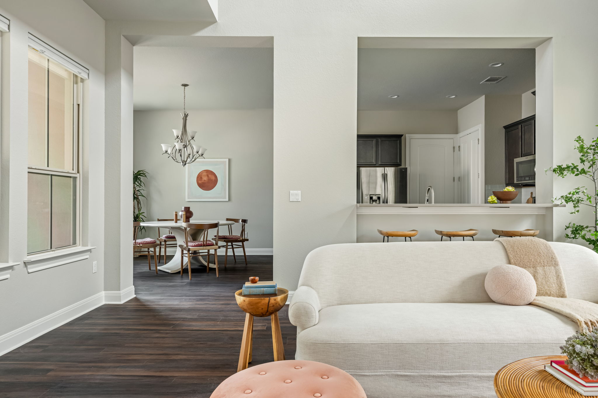 2516 Hopsack Mills Road Austin, TX 78748 - Photo 6 of 39 Spacious interior featuring dark wood-finish flooring, light grey walls, and white trim