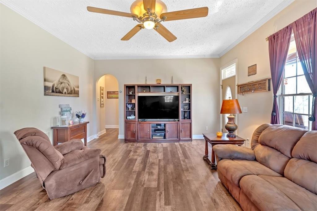 1430 Jasper Court Ranger, GA 30734 - Photo 18 of 49 a living room with furniture and a flat screen tv
