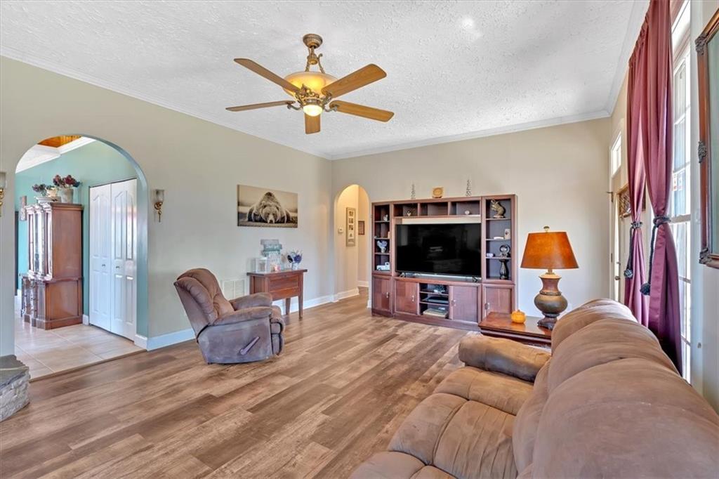 1430 Jasper Court Ranger, GA 30734 - Photo 19 of 49 a living room with furniture and a flat screen tv