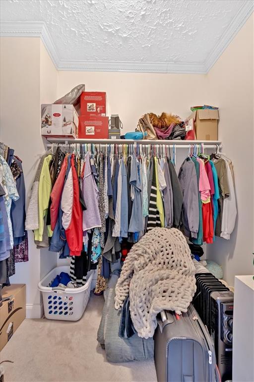 1430 Jasper Court Ranger, GA 30734 - Photo 27 of 49 a view of walk in closet with clothes and shoes
