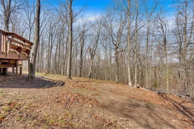 a view of a backyard of the house