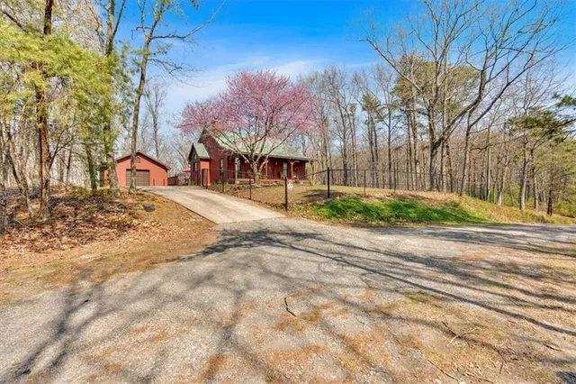 a view of a street with a building in the background