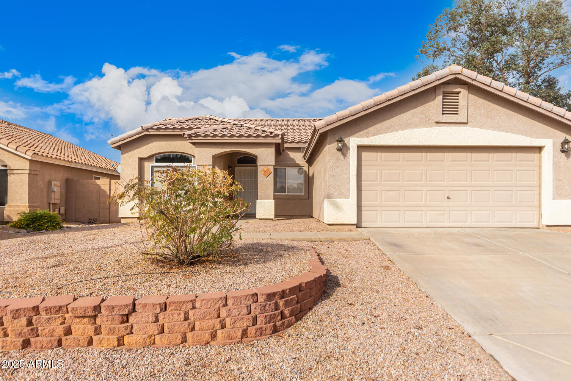 756 South Benton Mesa, AZ 85208 - Photo 1 of 9 a front view of a house with a yard