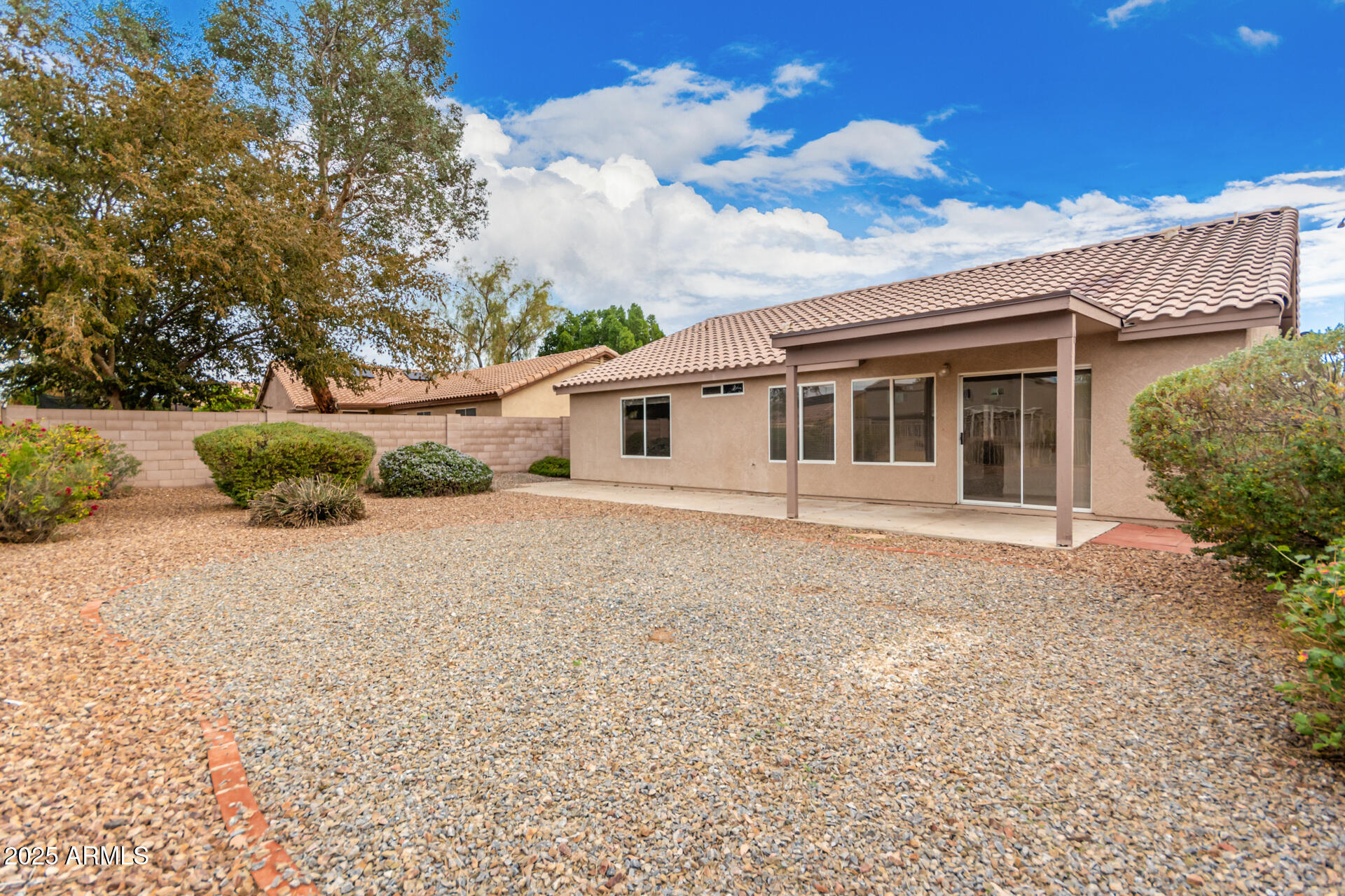 756 South Benton Mesa, AZ 85208 - Photo 9 of 9 a house with trees in the background