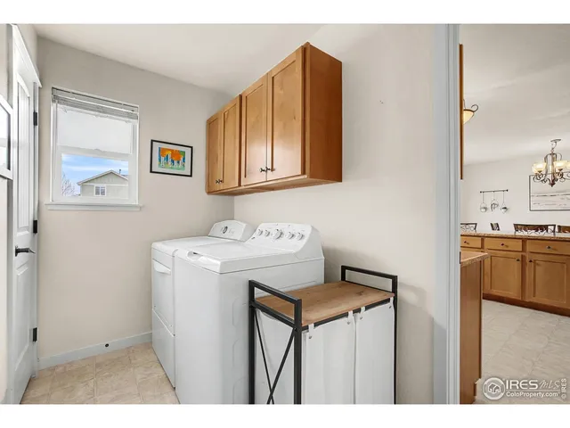 a kitchen with stainless steel appliances granite countertop wooden cabinets a sink and dishwasher