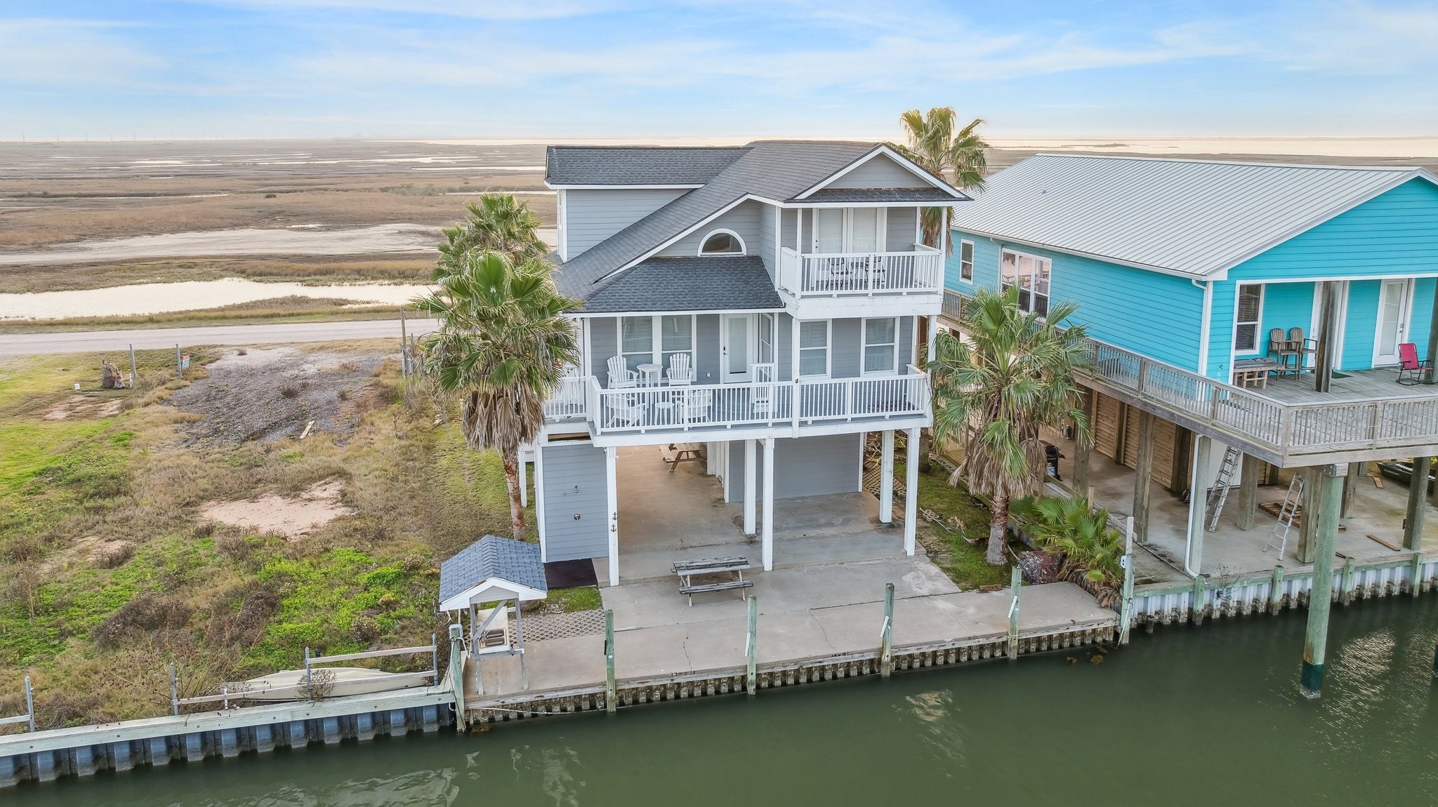 a view of a lake with a building in the background
