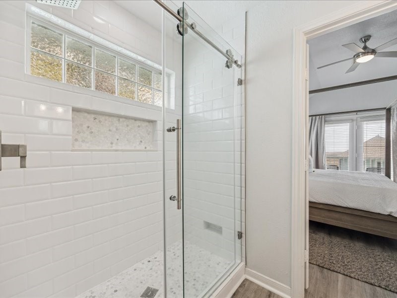 530 Dolphin Street Freeport, TX 77541 - Photo 16 of 29 a bathroom with a tub and a view of a bathroom