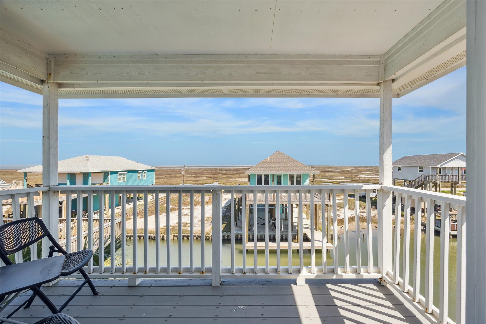 530 Dolphin Street Freeport, TX 77541 - Photo 17 of 29 a view of a balcony with a chair