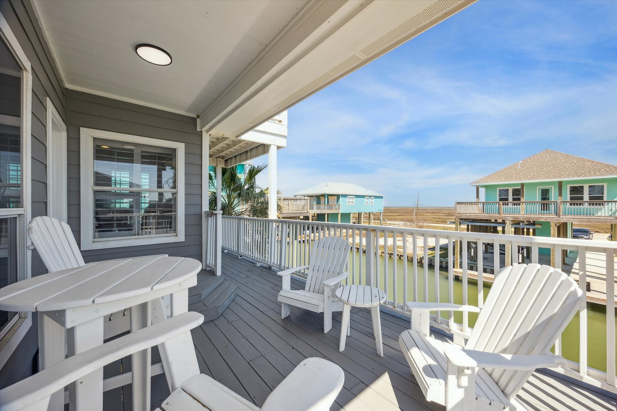 530 Dolphin Street Freeport, TX 77541 - Photo 5 of 29 a view of a balcony with chairs
