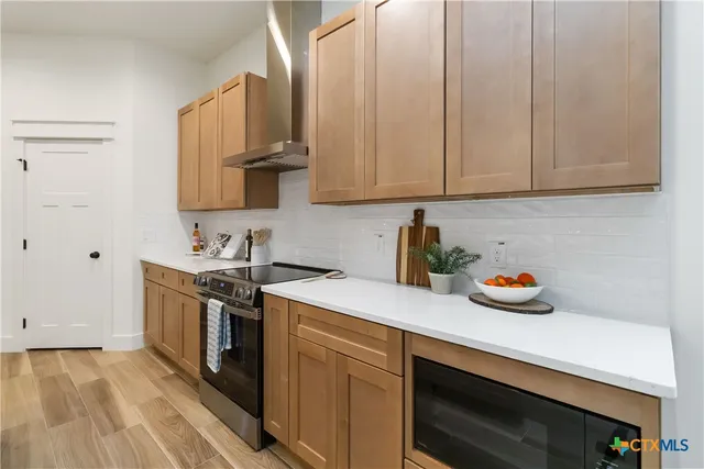 a view of a room that has a bench in it