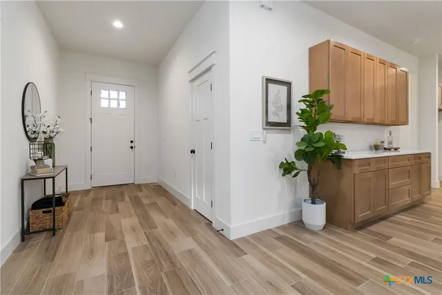 a spacious bathroom with a double vanity sink mirror and