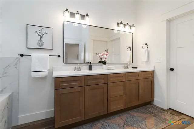 a view of room with window and hardwood floor