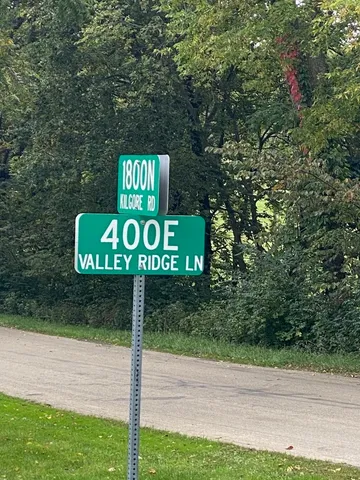 a sign that is on the side of a road