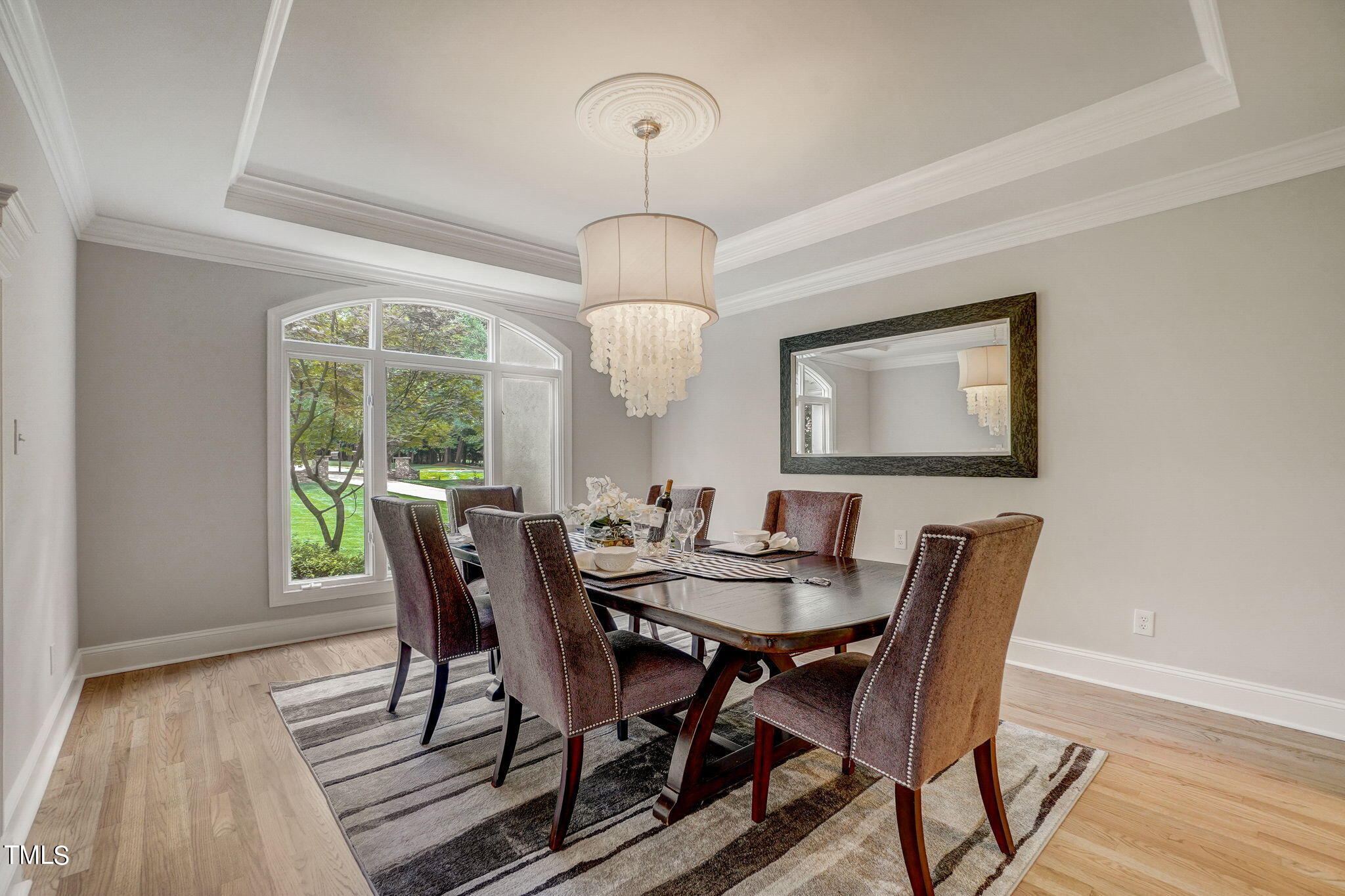 5101 Roseland Court Raleigh, NC 27613 - Photo 18 of 71 a view of a dining room with furniture window and wooden floor