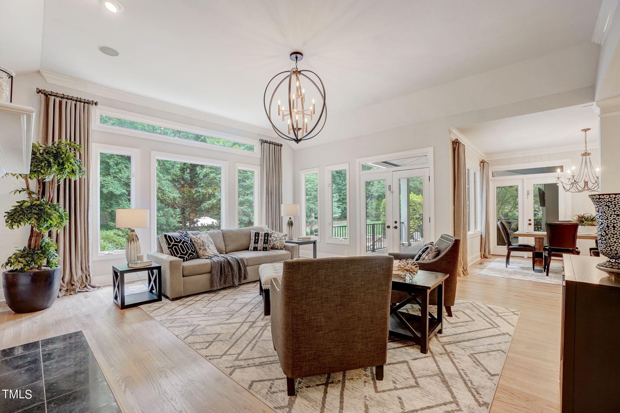 5101 Roseland Court Raleigh, NC 27613 - Photo 31 of 71 a view of a livingroom with furniture window and outside view