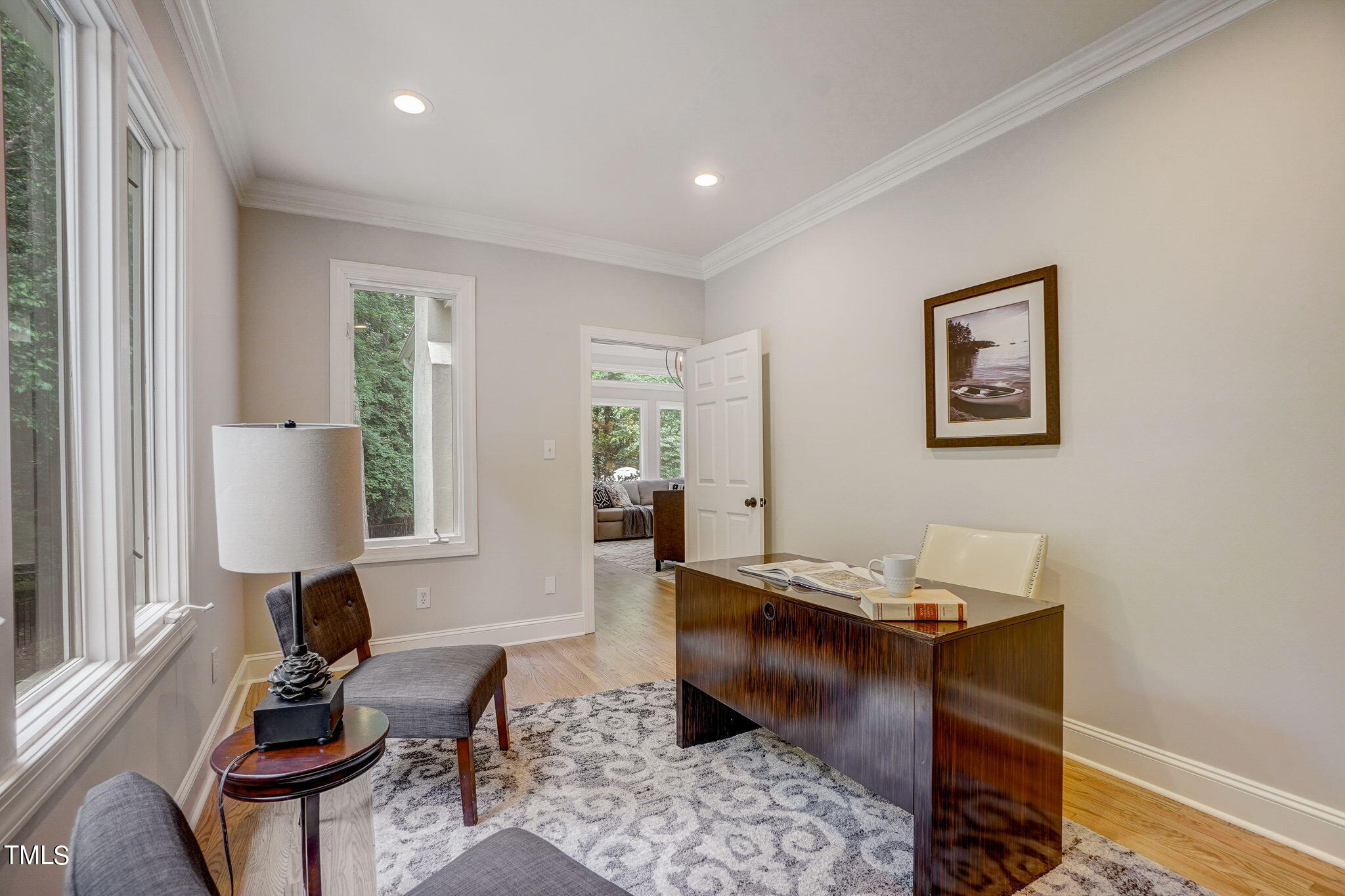 5101 Roseland Court Raleigh, NC 27613 - Photo 35 of 71 a living room with furniture and a window
